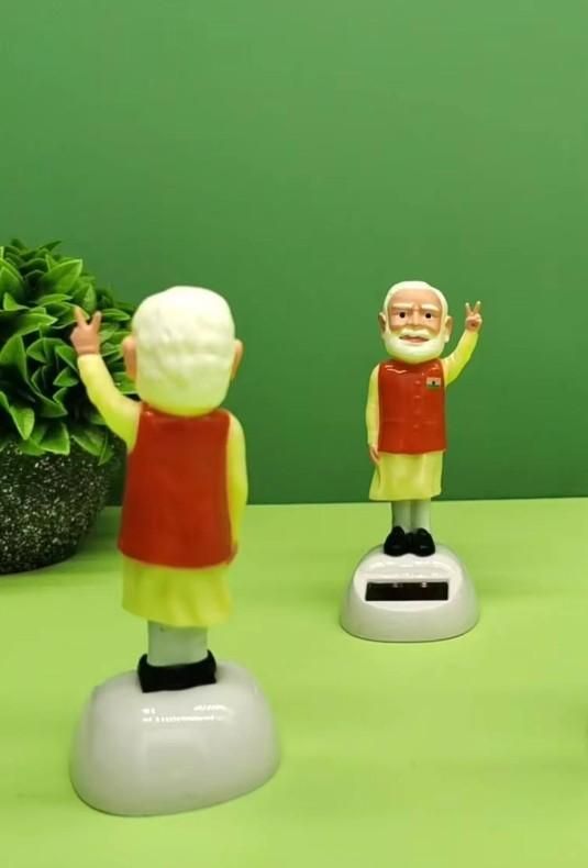 Solar Waving Modi Ji Statue: BUY 1 GET 1 FREE✨